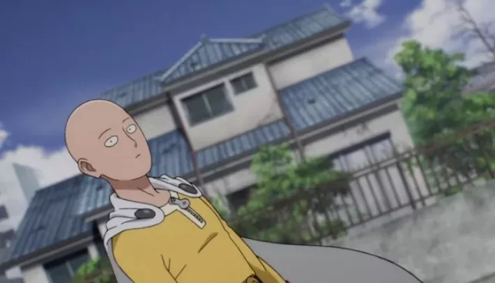 Anime Vs Real-life: Visiting Real-life location of One Punch Man - Saitama standing near a building